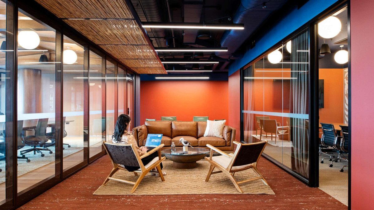 Epic-Melbourne-workplace-sitting-area-person-min-1200x675.jpg